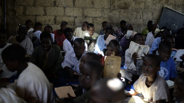 Students recite from the Koran at a school in Maiduguri in May 2014.