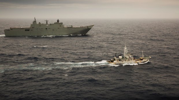 HMAS Adelaide escorts the former Japanese whaling vessel towards Hobart in December.