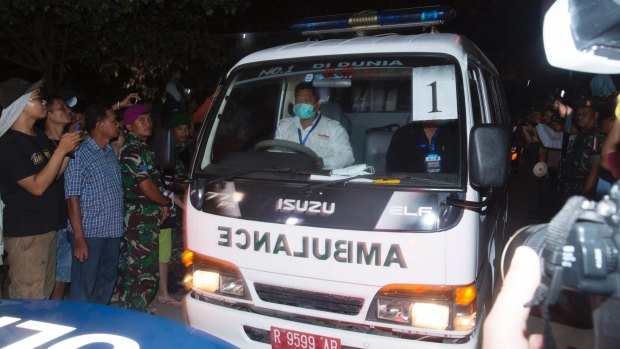 One of the ambulances carrying a coffin of one of the executed leaving Wijaya Pura in Cilacap.