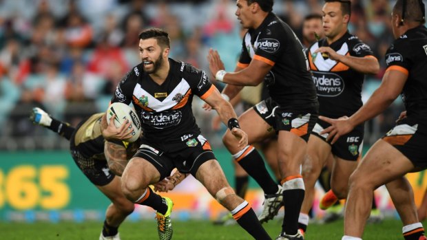 Star turn: James Tedesco spins out of a tackle in a compelling performance against the Panthers