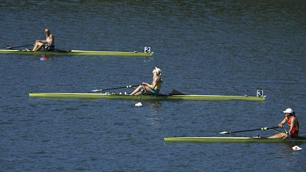 Kim Brennan (centre) after her gold medal-winning race in Rio. 