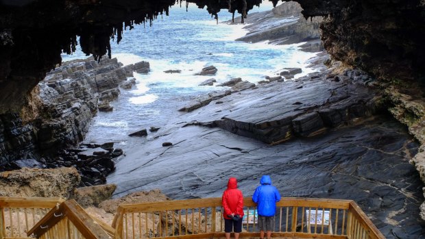 Tourists visit the cave of Admirals Arch on Kangaroo Island, South Australia.