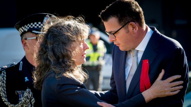 Premier Daniel Andrews pays his respect to Chrissie Foster after the service.