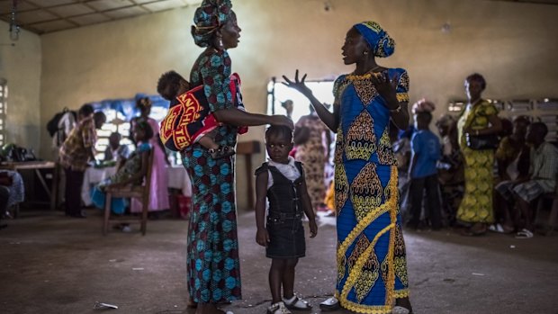 A Sunday service at United God Is Our Light Church in Monrovia, Liberia, in February. Last year, eight members died after congregants laid hands on a visitor with Ebola for a healing prayer.  