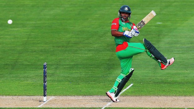 Tamim Iqbal of Bangladesh pulls the ball away for four.