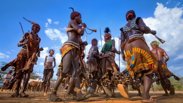 Dancing Hamer tribe in a ceremony of initiation of young men in Ethiopia. 