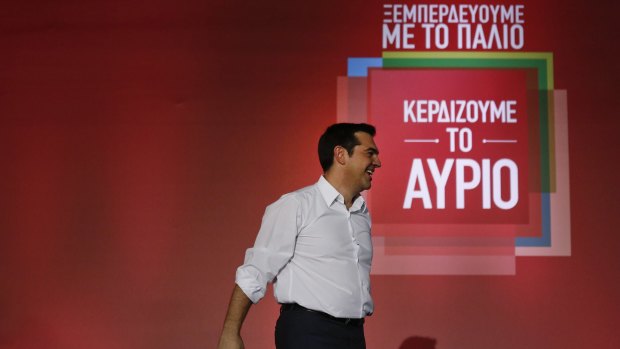 Alexis Tsipras, former Greek prime minister, arrives to speak during a pre-election rally in Athens on Friday.