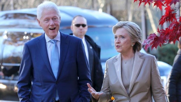 Hillary Clinton and her husband former president Bill Clinton talk after voting in Chappaqua, New York, on election day.