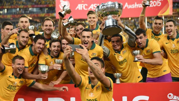 The Socceroos celebrate their 2015 Asian Cup victory with a selfie.