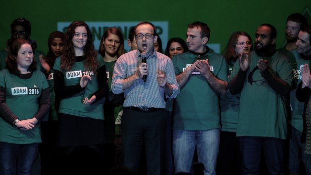 Adam Bandt  addresses supportersat an election night party.