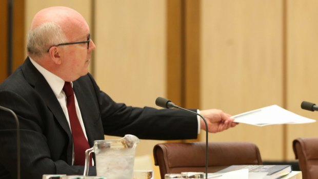 Attorney-General Senator George Brandis tables the Oxford English dictionary definition of the word "consult.