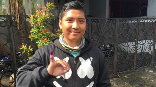 Fadli, 18, after casting his vote for Agus Harimurti Yudhoyono at Tanah Abang, Central Jakarta.  