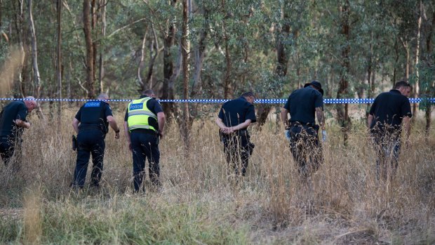 Police search bushland near where Mr Tennant was shot.