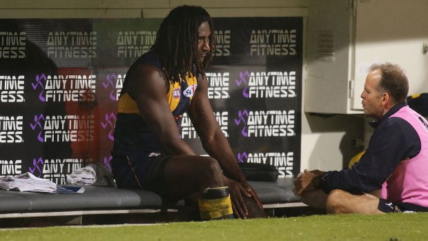 A dejected Nic Naitanui on the Eagles bench on Friday night.