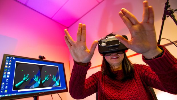 Universities are using virtual reality googles to teach students like Shan He subjects such as medicine and science.  