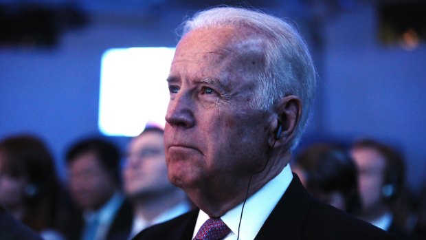 US Vice-President Joe Biden listens as Chinese President Xi Jinping speaks.