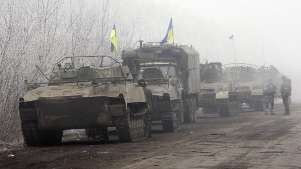 Ukrainian army vehicles on the road between Artemivsk and Debaltseve in Donetsk.