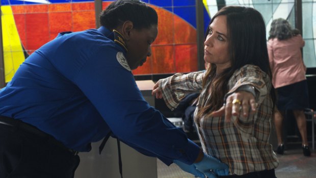 Pamela Adlon's Sam Fox is searched by a Transportation Security Administration agent in Better Things, season 3.