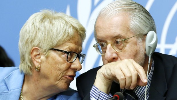 Brazilian Paulo Pinheiro, right, Chairman of the Commission of Inquiry on Syria, next to Switzerland's Carla del Ponte, left, delivering the report.
