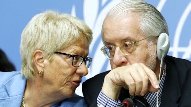 Brazilian Paulo Pinheiro, right, Chairman of the Commission of Inquiry on Syria, next to Switzerland's Carla del Ponte, left, delivering the report.