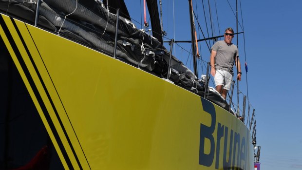 It's good to be home: Melbourne-born, elite international racing navigator Andrew Cape  on the yacht Brunel at Victoria Harbour.