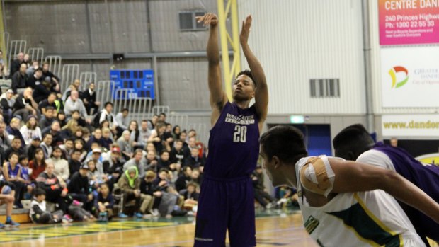 Star in the making: University of Washington's  Markele Fultz shoots a free throw against Dandenong Rangers on Wednesday night. 