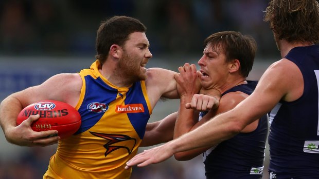 Jeremy McGovern in a scuffle with Nick Suban at the last Western Derby at Domain Stadium.