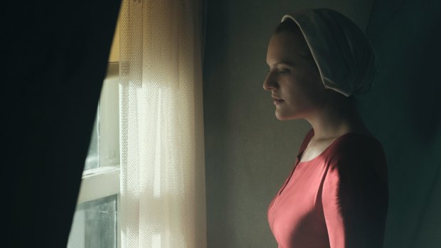 Elisabeth Moss as Offred in <i>The Handmaid's Tale</i>, which explains how easily manufactured fear can be used to control and oppress.
