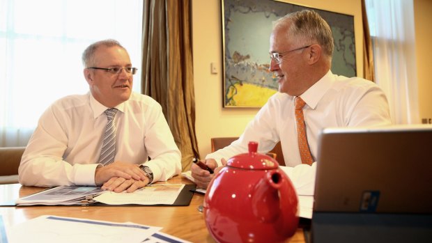 Prime Minister Malcolm Turnbull and Treasurer Scott Morrison in the Prime Minister's suite on Monday morning, budget eve.