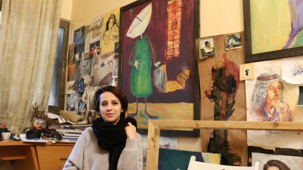 Majdal Nateel, 28, a Palestinian artist, in her studio in Gaza.