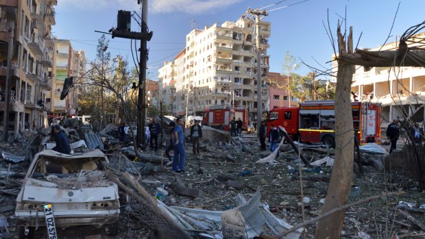 The aftermath of Friday's explosion in the south-eastern Turkish city of Diyarbakir,  which authorities blamed on a car bomb planted by Kurdish terrorists.