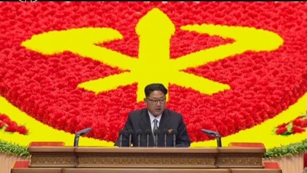 Leader: Kim Jong-un, unusually in a suit, speaks at the party congress in Pyongyang, on Saturday.