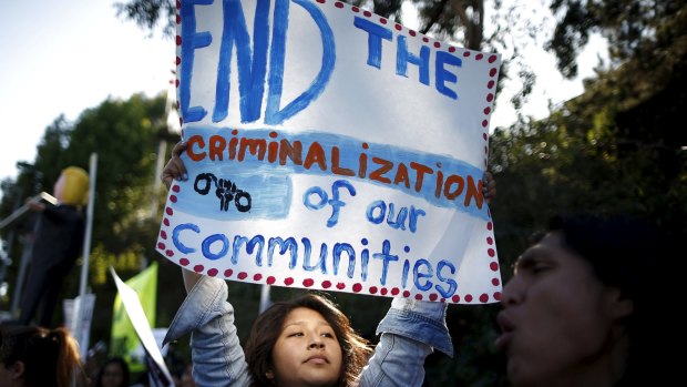 Nancy Rosales Hernandez, 23, protests outside a Donald Trump speech venue in Los Angeles. 