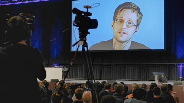 American whistleblower Edward Snowden appears at the 34th Chaos Communication Congress (34c3) in Leipzig, Germany, last month via video link.