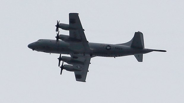 A US P3 Orion surveillance plane flying over Marawi, in the Philippines, earlier this month. Australia is expected to soon send P3 Orions to join the fight.