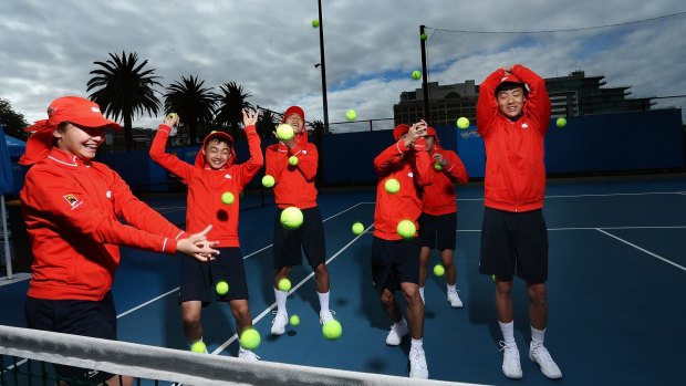 In the lead-up to the Australian Open tennis championship Chinese ballkids play their own variation of "Shoe Cricket" during training at Albert reserve.