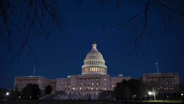 With no apparent indications of a breakthrough in the Senate to avoid a government shutdown, the Capitol is illuminated on Friday evening.