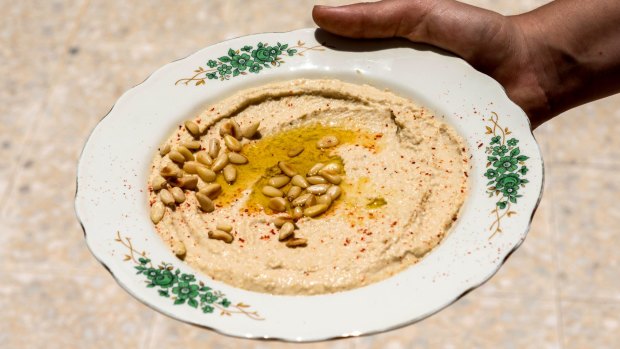 A group of eight Chinese tourists notched up a bill of more than $US4000 after an evening at a hummus eatery.