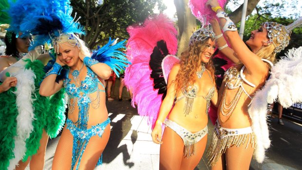 Participants and party goers prepare for the Gay and Lesbian Mardi Gras at Hyde Park in March last year.