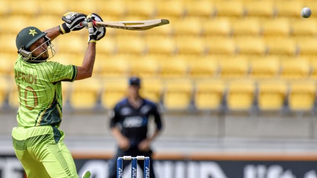 In hot water: Shahid Afridi plays a shot through the off-side against New Zealand in Wellington.