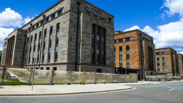A subcontractor is chasing nearly $60,000 owed for work undertaken at the John Gorton Building.