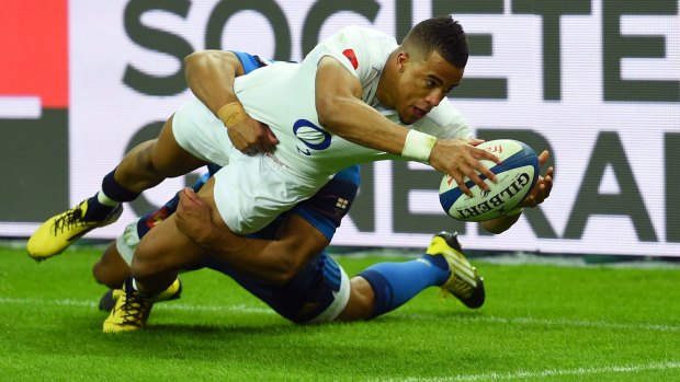 Clear: Anthony Watson scores against France in the Six Nations Championship.