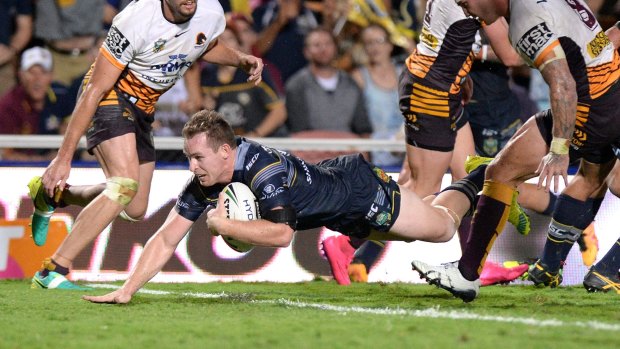 Match-winner: Michael Morgan scores for the Cowboys in Townsville. 