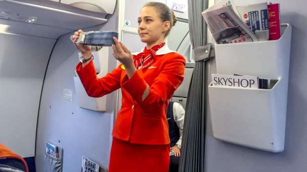 What nickname do flight attendants call the process of checking passengers are wearing their seatbelts?