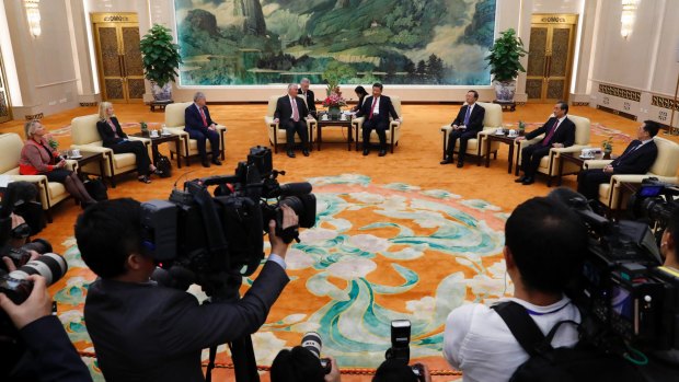 Great expectations: US Secretary of State Rex Tillerson and China's President Xi Jinping meet the press.