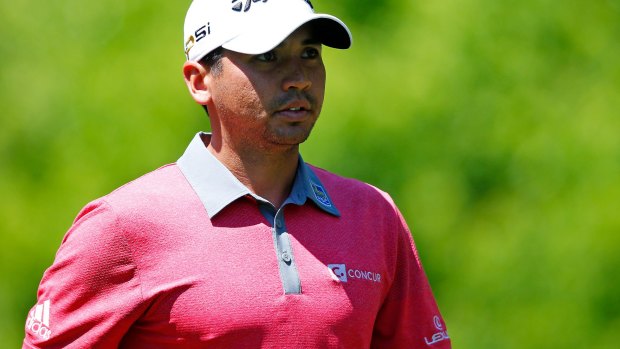 Inspirational journey: Jason Day walks down a fairway during a practice round on Tuesday.