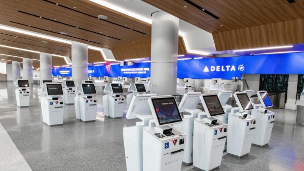 T2 and T3 share an airy new Delta check-in/bag drop area with 32 self-serve booths and 46 check in positions. 