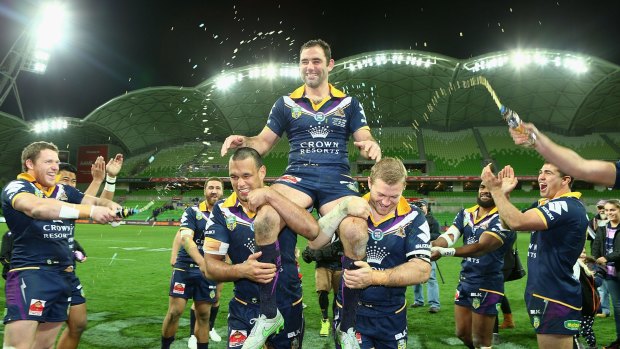 Recognition: Cameron Smith is chaired off after playing his 300th game for the Storm.