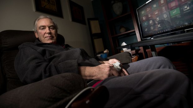 Geoff Woodrow, who lives with motor neuron disease, communicates through eye gaze technology and speech machine.