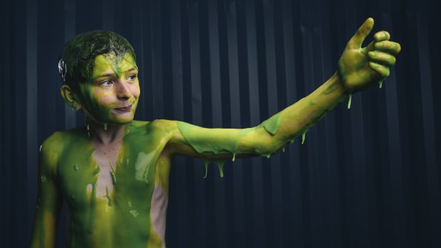 It takes 15 minutes to wash off the slime but Rhys Toms believes it's worth it.